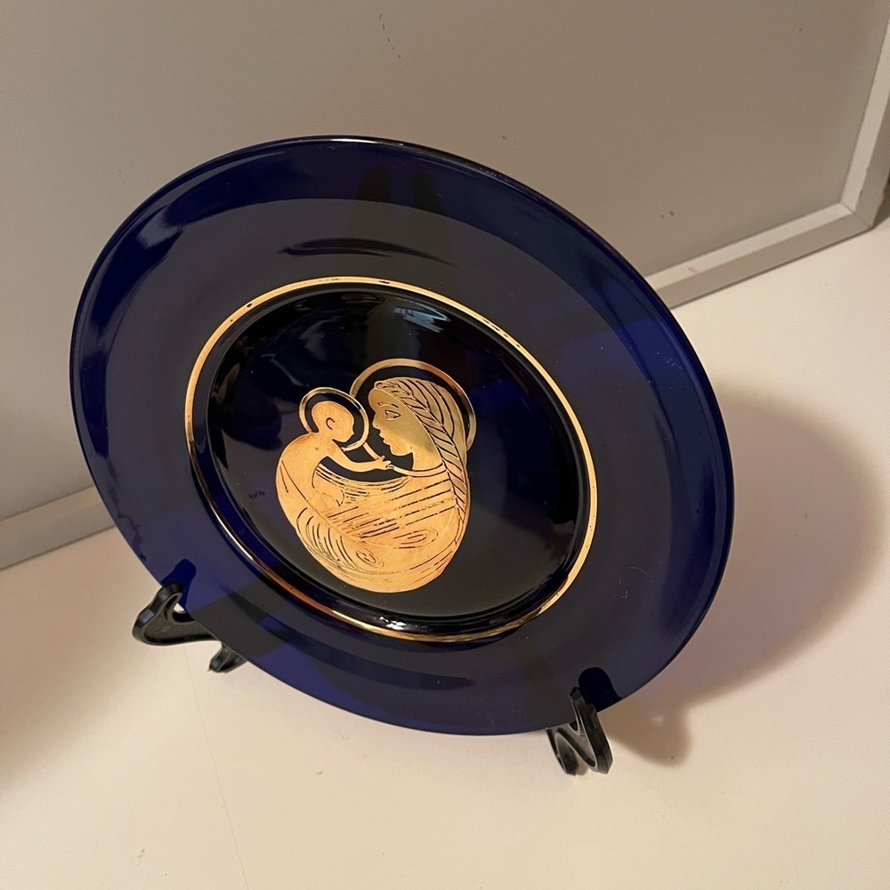 A lovely vintage cobalt blue plate with gold decoration of Madonna & Child.
